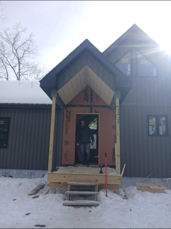 Ray Builders crew framing a custom home entryway in Eastern Maine